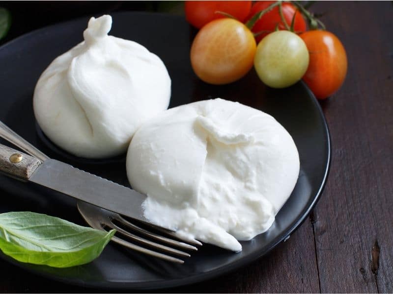 burrata and cherry tomatoes with basil